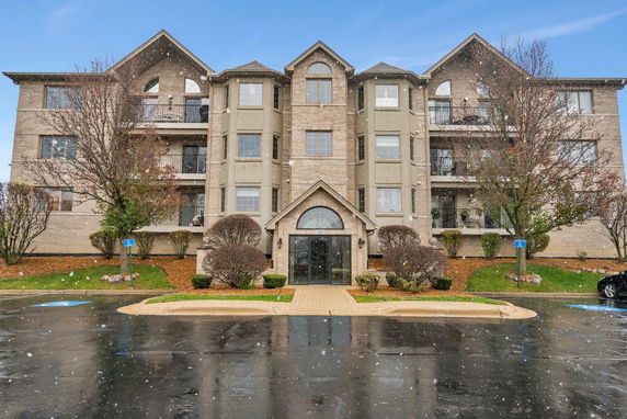 Front view of a multi-story apartment building.