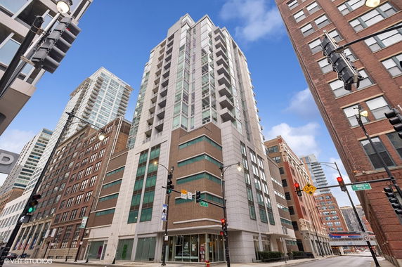 Front view of a multi-story building with modern architecture.
