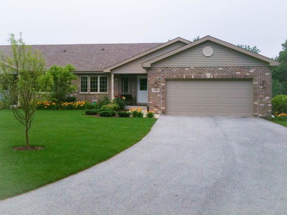 Front view of a single-story house with a double garage.