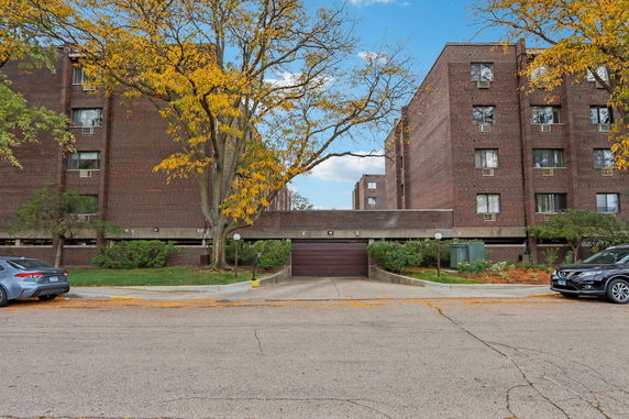 Front view of a multi-story brick building.