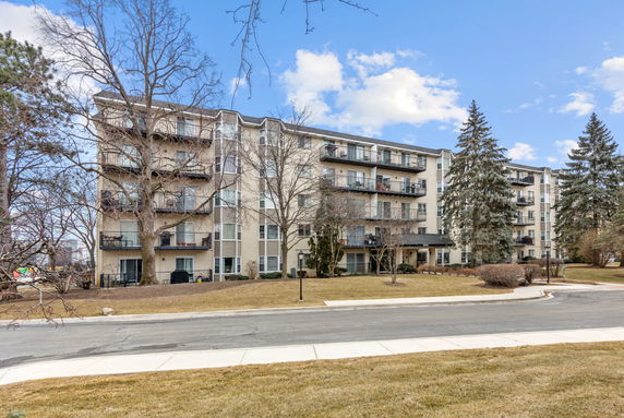Front view of a multi-story apartment building.