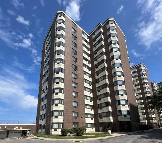 Front view of a multi-story apartment building.
