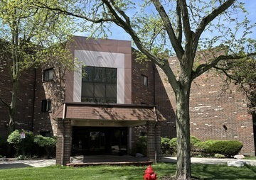 Front view of a building with a brick exterior.