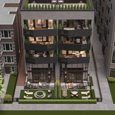 Front view of a multi-story residential building with balconies and rooftop garden.