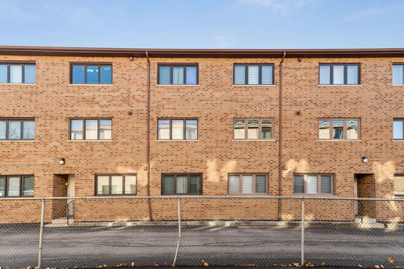 Front view of a three-story brick building