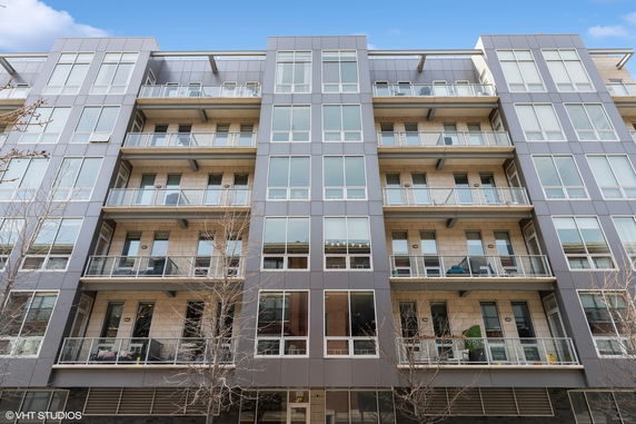 Front view of a multi-story apartment building.