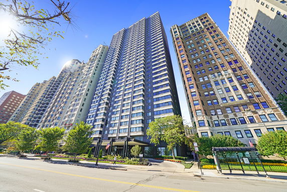 Front view of tall residential buildings with modern architecture.