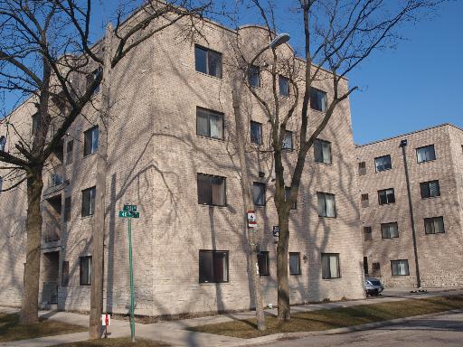 Front view of a multi-story apartment building.