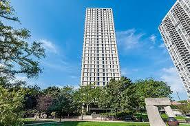 Front view of a tall multi-story building.