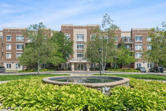 Front view of a multi-story brick building.