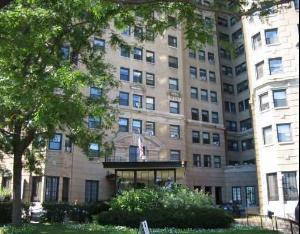 Front view of a multi-story residential building.