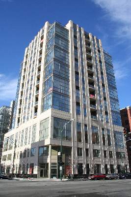 Front view of a multi-story modern building.