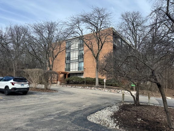 Front view of a multi-story brick building.