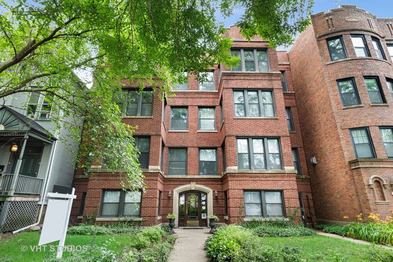 Front view of a multi-story brick building