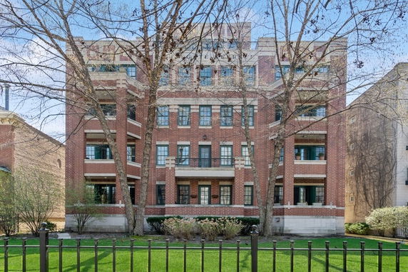 Front view of a multi-story brick building.