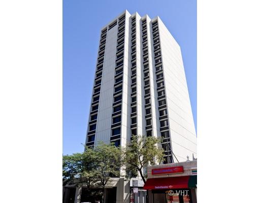 Front view of a high-rise building with multiple floors.