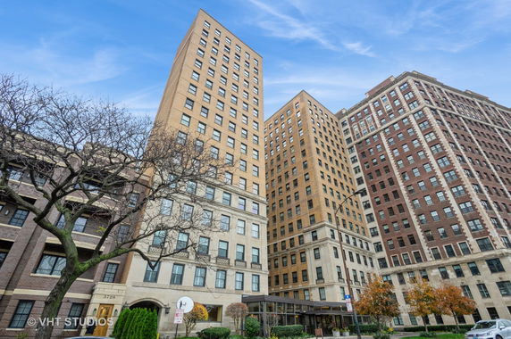 Front view of tall apartment buildings.