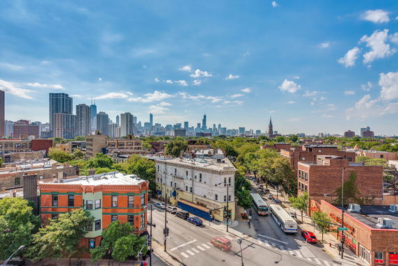 Panoramic view of a cityscape with buildings and roads