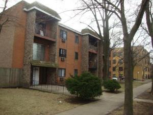 Front view of a multi-story apartment building.