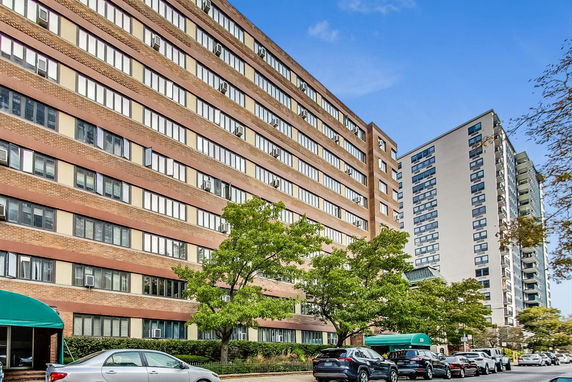 Front view of a multi-story apartment building.