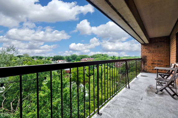 Outdoor view from a balcony showcasing a scenic landscape.