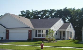 Front view of a single-story house with a garage.