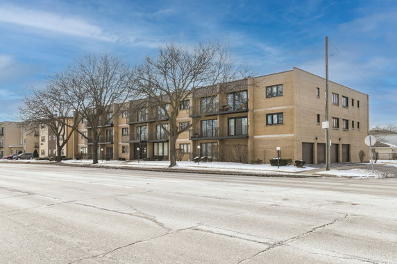 Front view of a multi-story apartment building.