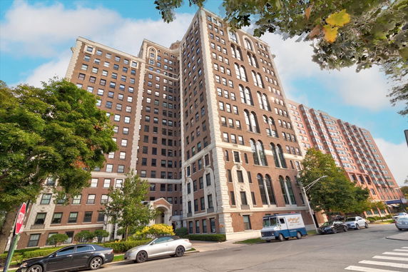 Front view of a multi-story brick building.
