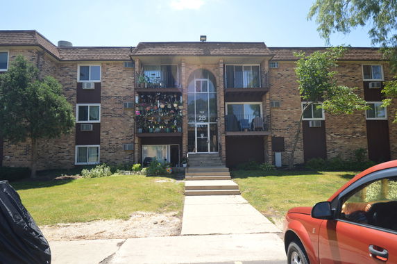 Front view of a three-story apartment building