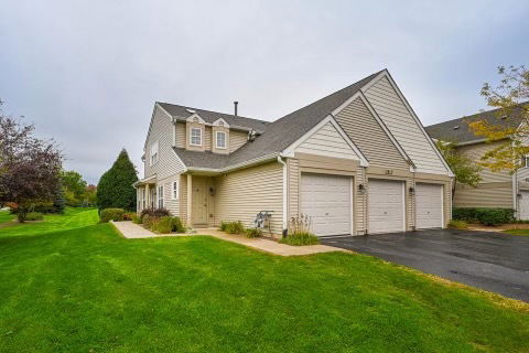 Front view of a house with an attached double garage.