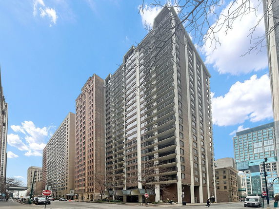 Front view of a high-rise building in an urban area.