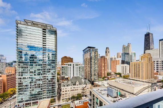 View of a cityscape featuring several skyscrapers and modern buildings.