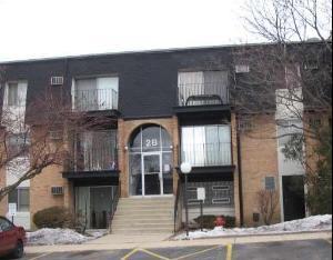 Front view of a three-story apartment building.