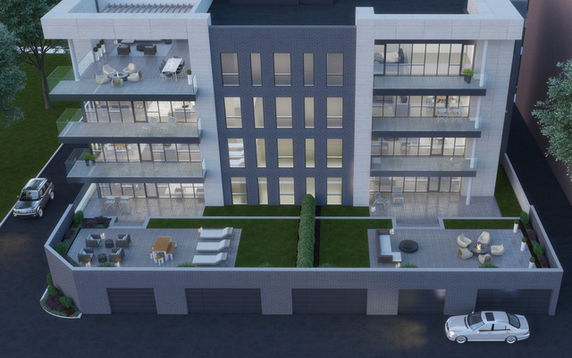 Front view of a multi-story modern building with balconies.