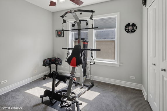 Room with exercise equipment and workout machine