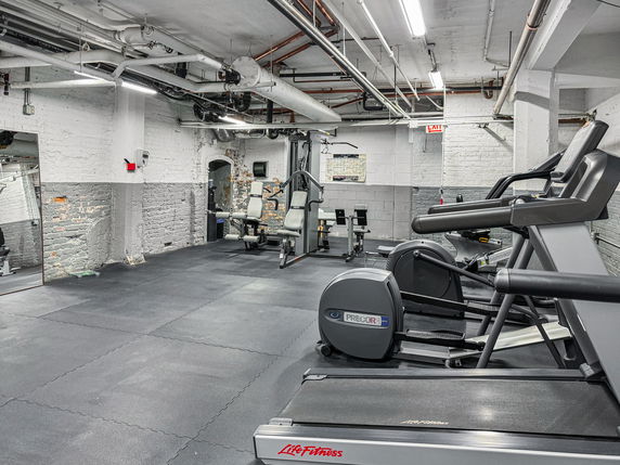 Indoor gym area with exercise equipment