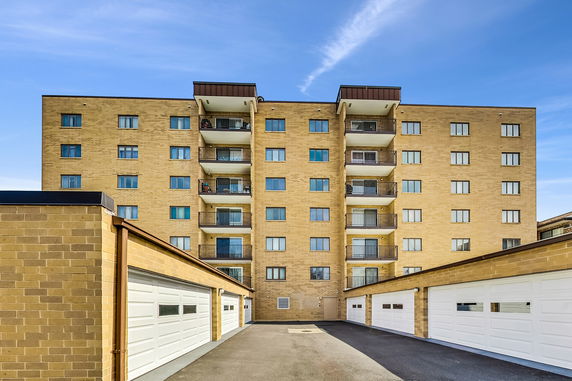 Front view of a multi-story apartment building.