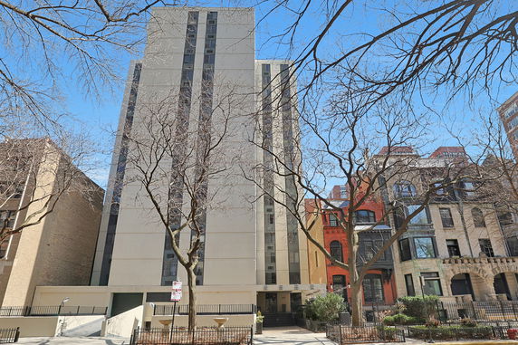 Front view of a multi-story building with a modern facade.