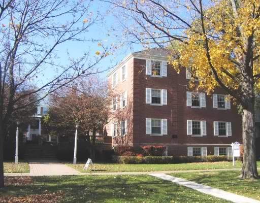 Front view of a multi-story brick building.