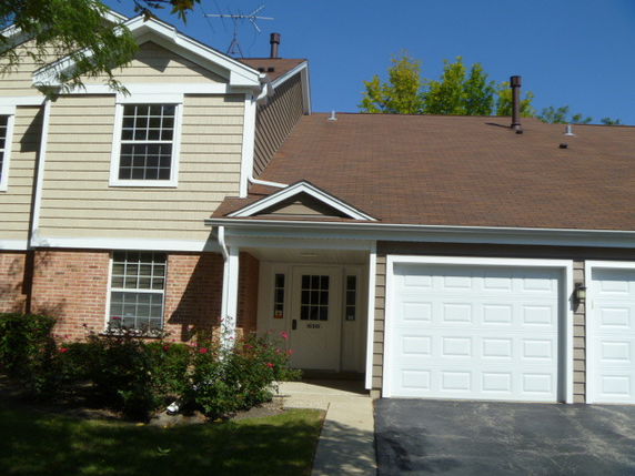 Front view of a house with a double garage.