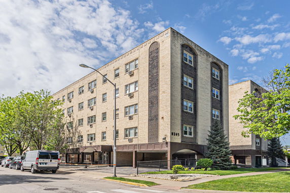 Front view of a multi-story apartment building.
