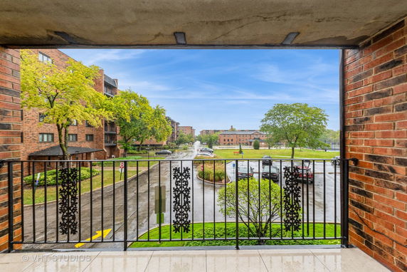 View of surrounding residential buildings from a balcony.