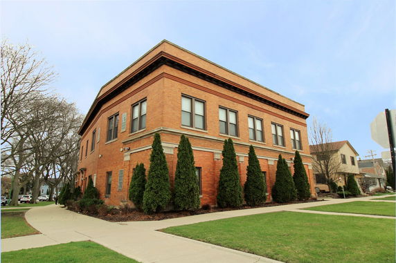 Front view of a two-story brick building.