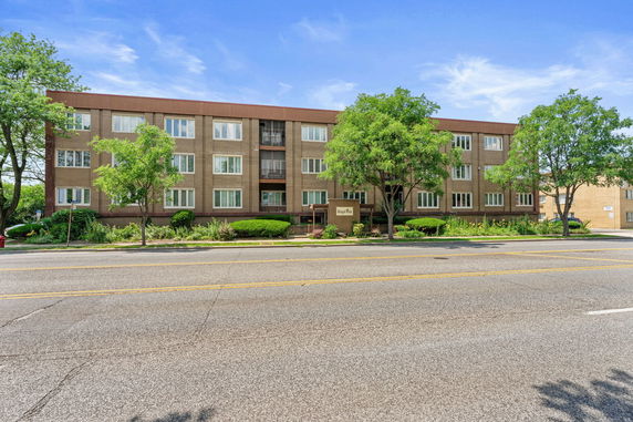 Front view of a multi-story residential building.