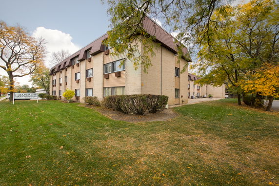 Front view of a three-story condominium building.