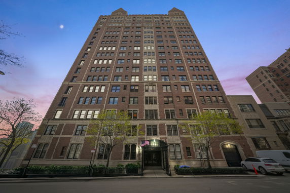 Front view of a multi-story brick building.