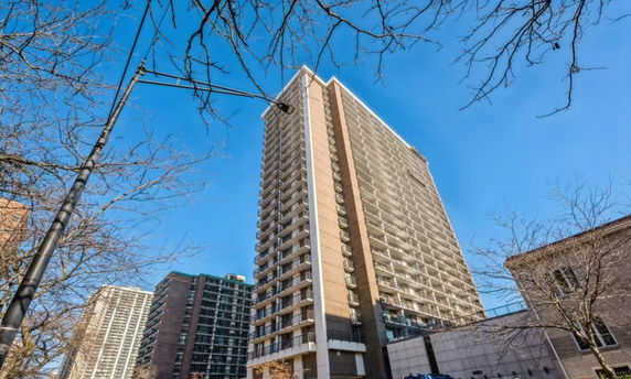 Front view of a high-rise residential building.