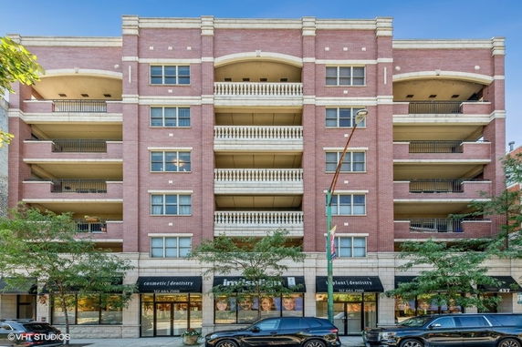 Front view of a multi-story brick building.