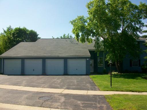 Front view of a house with a triple garage.