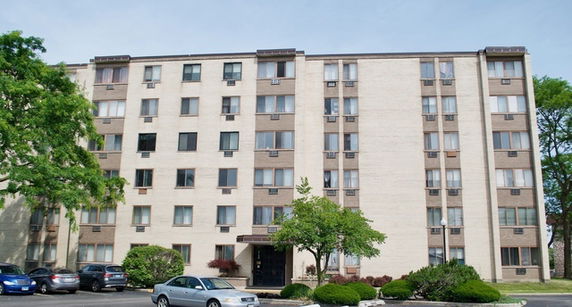 Front view of a multi-story apartment building.